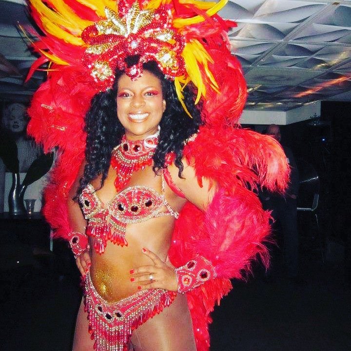 Zezeh posing with her hands on her hips